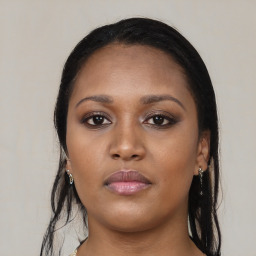 Neutral black young-adult female with long  black hair and brown eyes