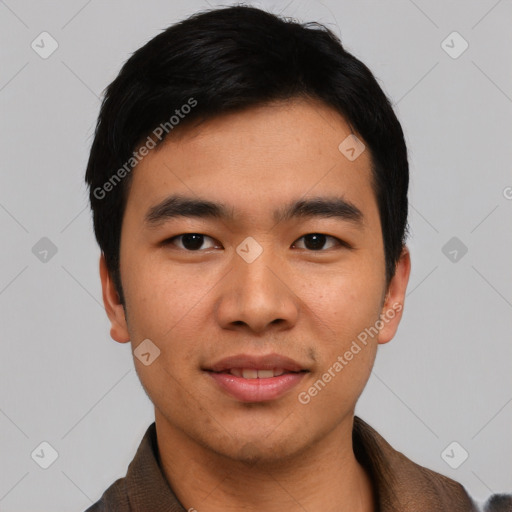 Joyful asian young-adult male with short  black hair and brown eyes