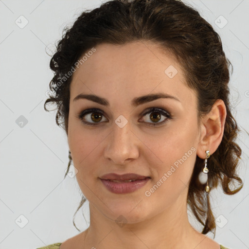 Joyful white young-adult female with medium  brown hair and green eyes