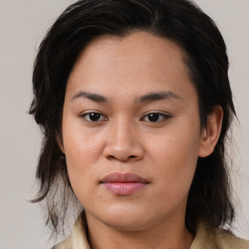 Joyful asian young-adult female with medium  brown hair and brown eyes