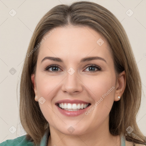 Joyful white young-adult female with long  brown hair and grey eyes