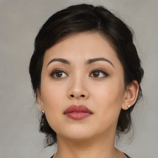 Neutral asian young-adult female with medium  black hair and brown eyes