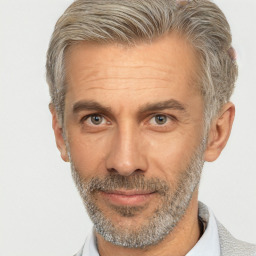 Neutral white middle-aged male with short  gray hair and brown eyes