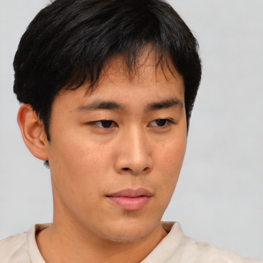 Neutral asian young-adult male with short  black hair and brown eyes