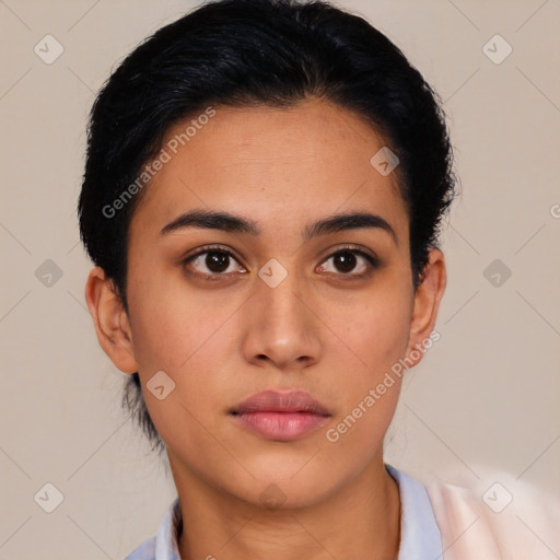 Neutral latino young-adult female with short  black hair and brown eyes