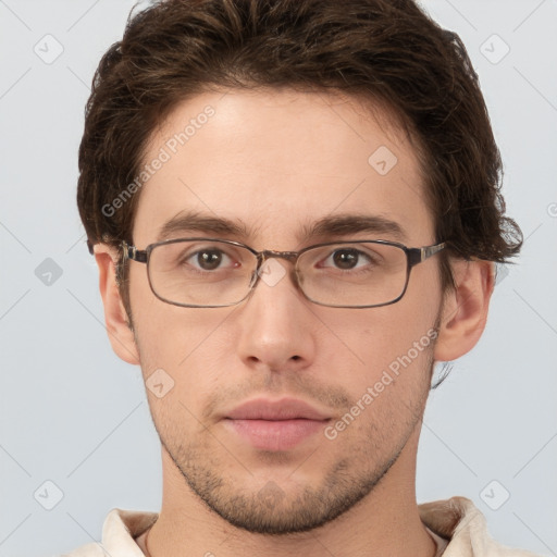 Neutral white young-adult male with short  brown hair and grey eyes