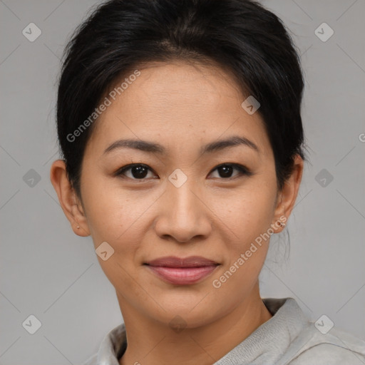 Joyful asian young-adult female with short  brown hair and brown eyes