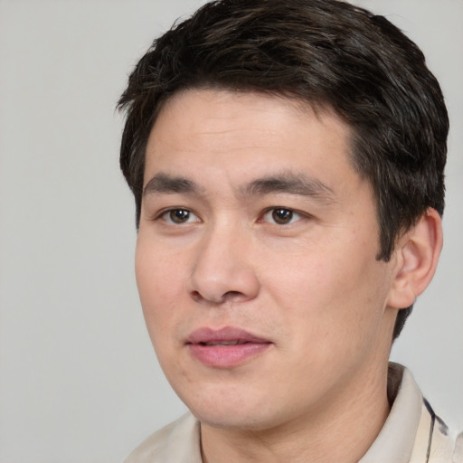 Neutral white young-adult male with short  black hair and brown eyes