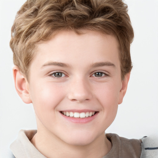 Joyful white child male with short  brown hair and brown eyes