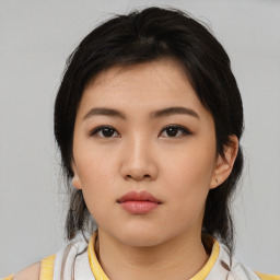 Neutral asian young-adult female with medium  black hair and brown eyes