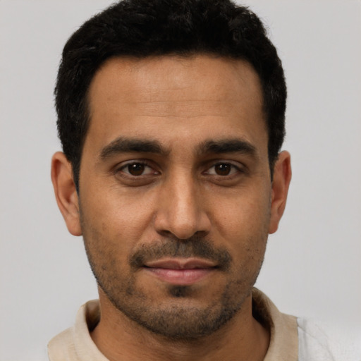 Neutral white young-adult male with short  black hair and brown eyes