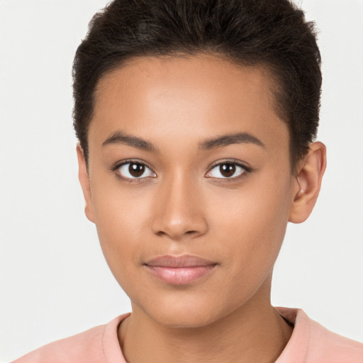 Joyful latino young-adult female with short  brown hair and brown eyes