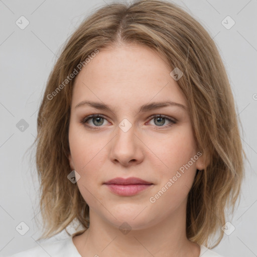 Joyful white young-adult female with medium  brown hair and green eyes