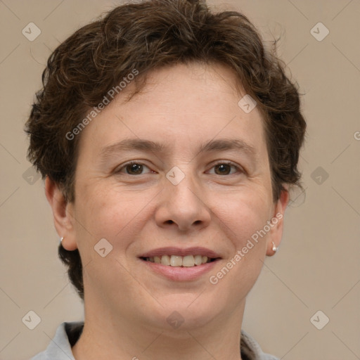 Joyful white adult female with short  brown hair and brown eyes