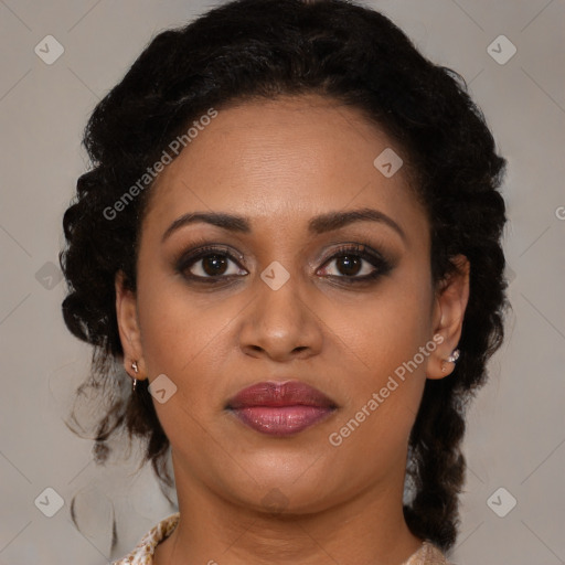 Joyful black young-adult female with medium  brown hair and brown eyes