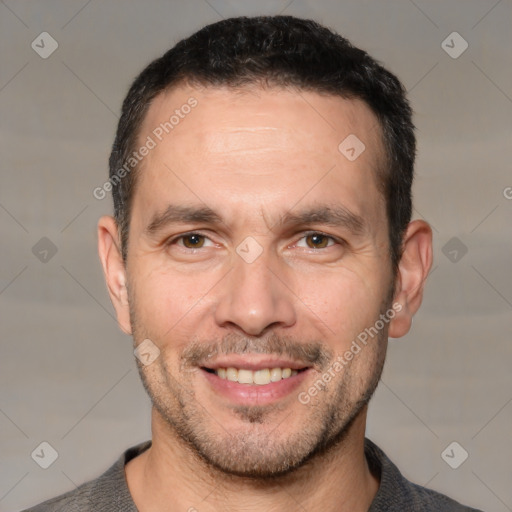 Joyful white adult male with short  brown hair and brown eyes