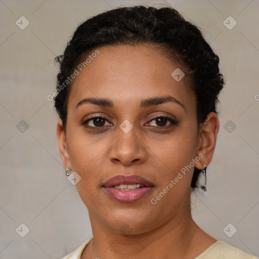 Joyful latino young-adult female with short  brown hair and brown eyes