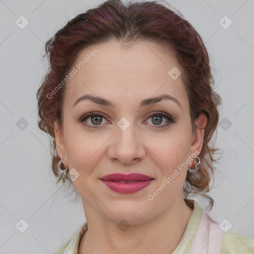 Joyful white young-adult female with medium  brown hair and green eyes