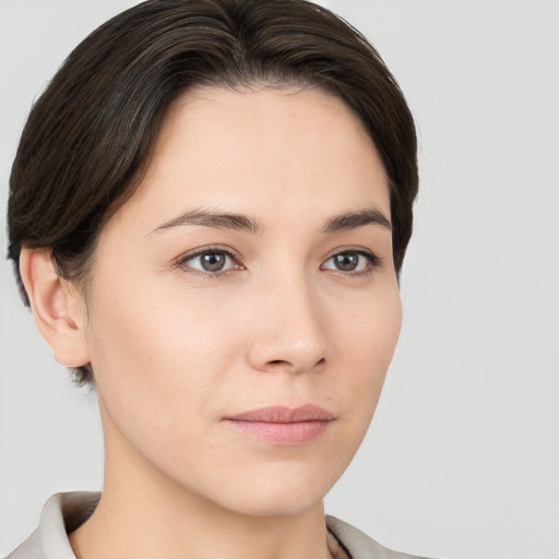 Neutral white young-adult female with medium  brown hair and brown eyes