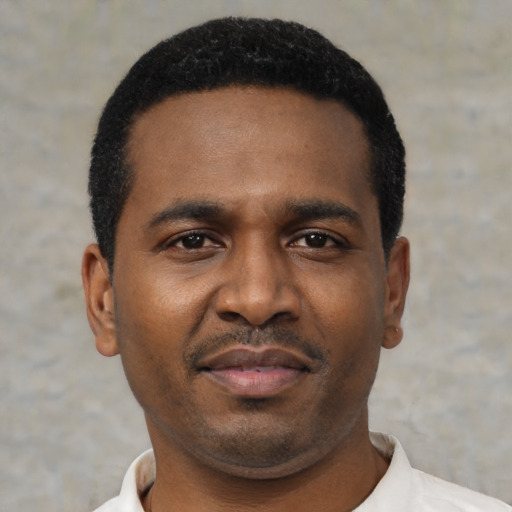 Neutral black young-adult male with short  black hair and brown eyes
