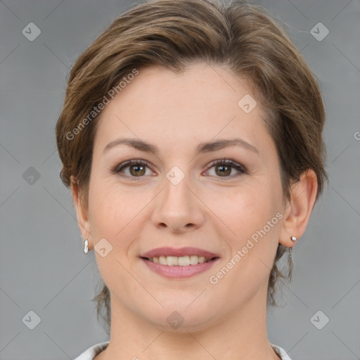 Joyful white young-adult female with medium  brown hair and grey eyes