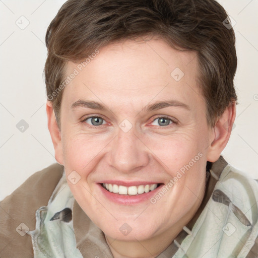 Joyful white adult female with short  brown hair and grey eyes