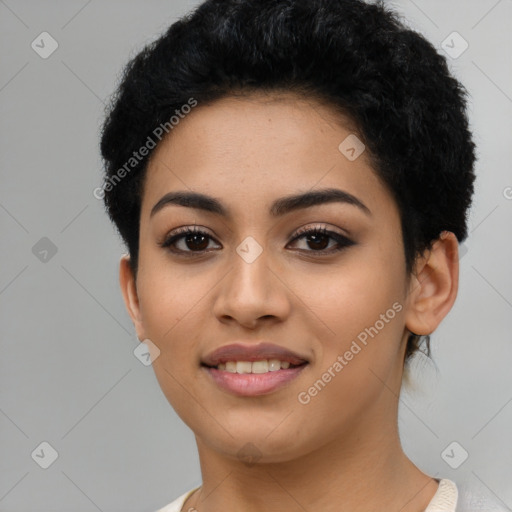 Joyful latino young-adult female with short  black hair and brown eyes