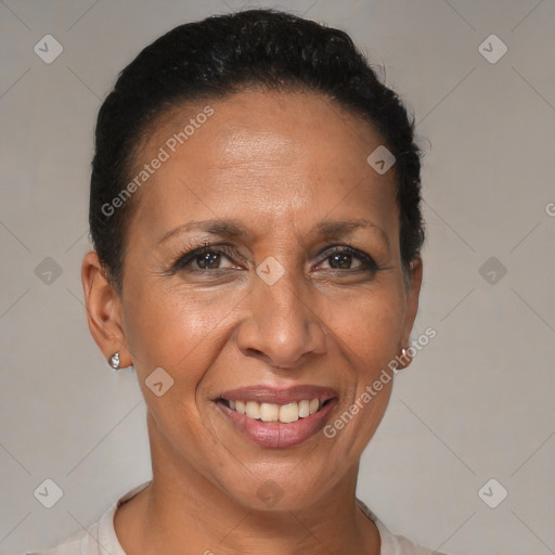 Joyful black adult female with short  brown hair and brown eyes