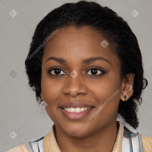 Joyful latino young-adult female with long  black hair and brown eyes