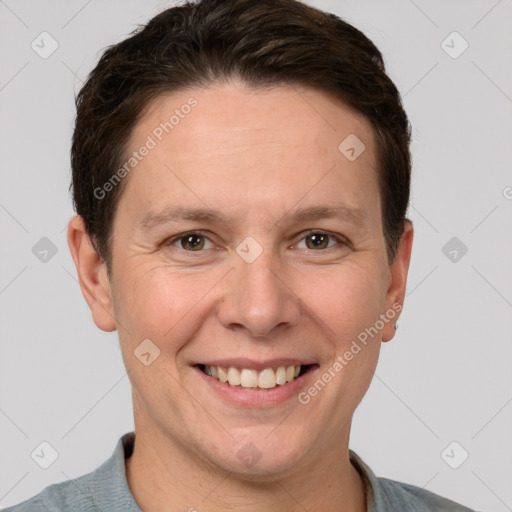 Joyful white adult male with short  brown hair and grey eyes