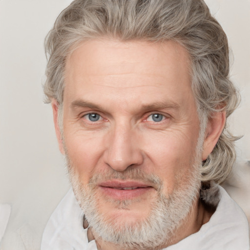 Joyful white middle-aged male with short  brown hair and grey eyes