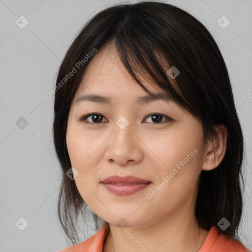 Joyful white young-adult female with medium  brown hair and brown eyes