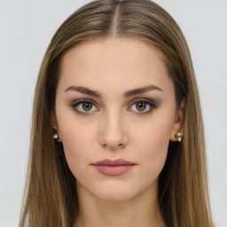 Neutral white young-adult female with long  brown hair and brown eyes