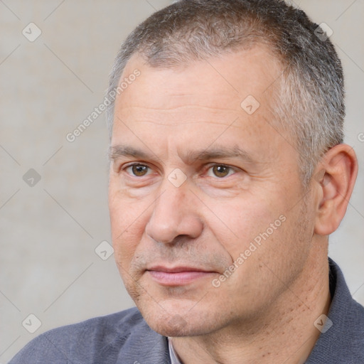 Joyful white middle-aged male with short  brown hair and brown eyes