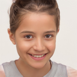 Joyful white child female with short  brown hair and brown eyes