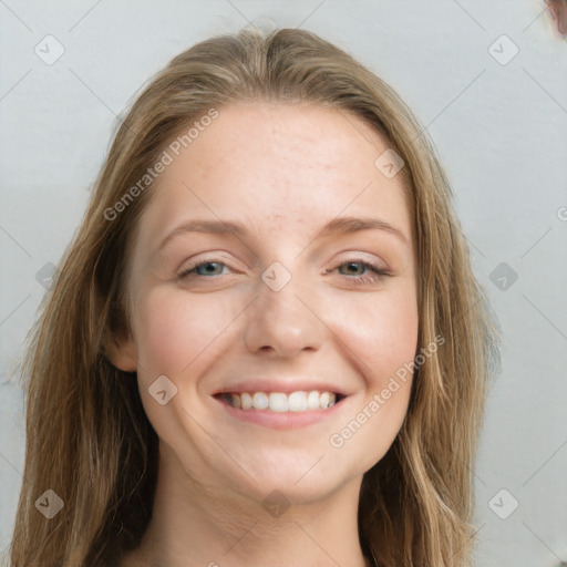 Joyful white young-adult female with long  brown hair and grey eyes