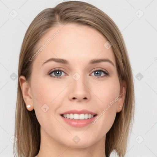 Joyful white young-adult female with long  brown hair and grey eyes