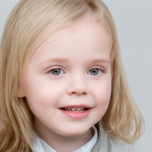 Joyful white child female with medium  brown hair and blue eyes