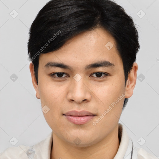 Joyful asian young-adult male with short  brown hair and brown eyes