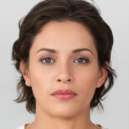 Neutral white young-adult female with medium  brown hair and brown eyes