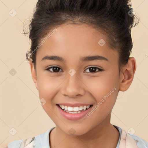 Joyful white child female with short  brown hair and brown eyes