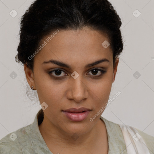 Joyful latino young-adult female with short  brown hair and brown eyes