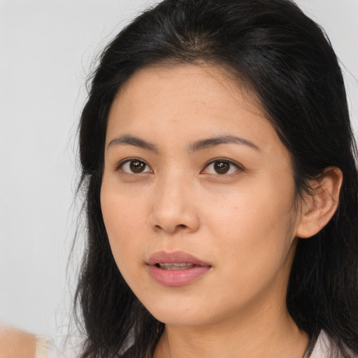 Neutral asian young-adult female with long  brown hair and brown eyes