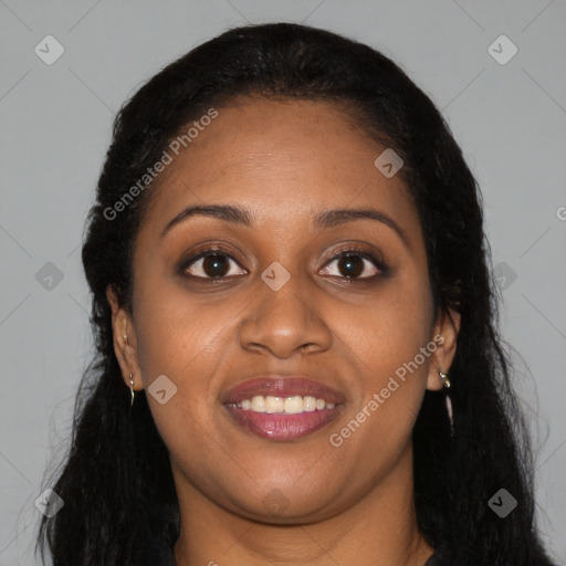 Joyful black young-adult female with long  brown hair and brown eyes