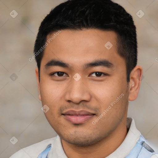 Joyful asian young-adult male with short  black hair and brown eyes