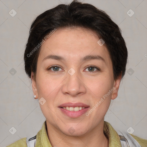 Joyful white adult female with short  brown hair and brown eyes