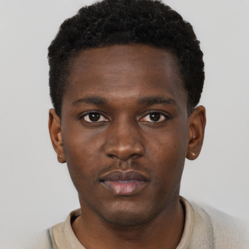 Neutral black young-adult male with short  brown hair and brown eyes
