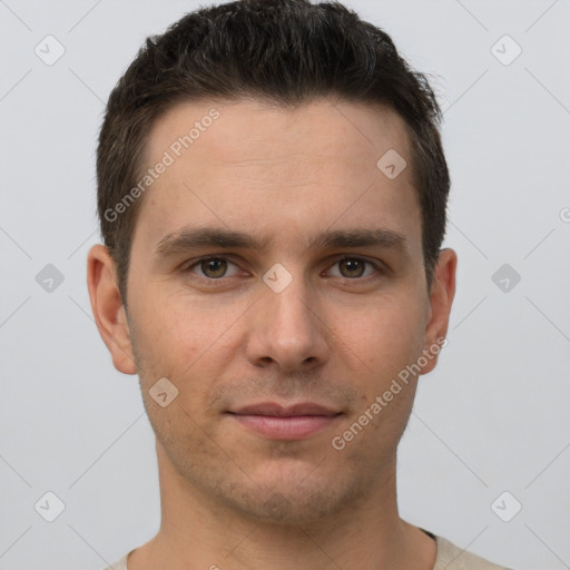 Joyful white young-adult male with short  brown hair and brown eyes