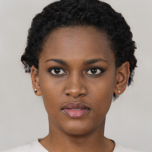 Neutral black young-adult female with short  black hair and brown eyes