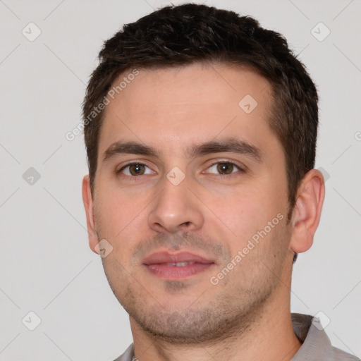 Neutral white young-adult male with short  brown hair and brown eyes